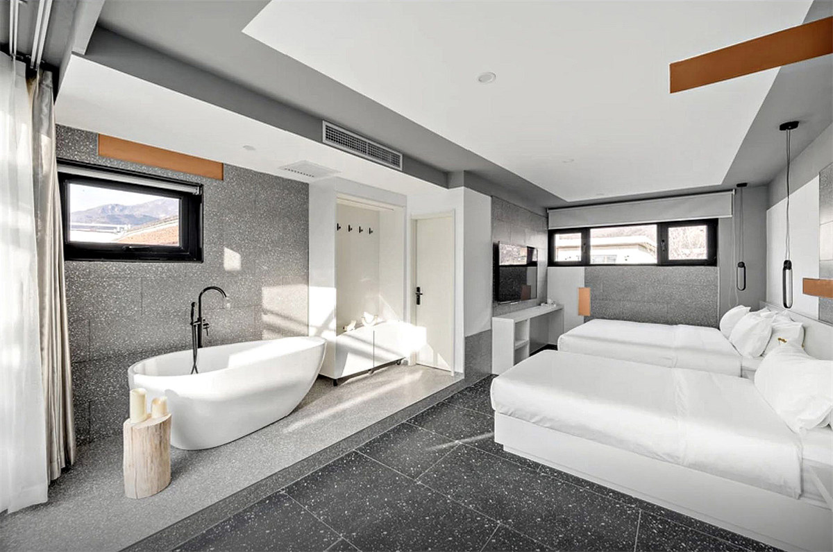 現(xiàn)代輕奢風農家院改造民宿裝修設計案例(圖7) 現(xiàn)代輕奢風農家院改造民宿裝修設計案例(圖7)