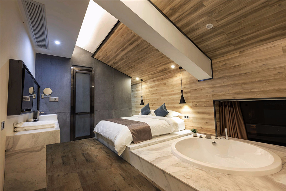 焦作九曲竹文化主題民宿酒店客房裝修設(shè)計(jì)實(shí)景圖